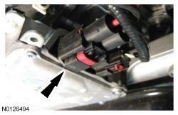 All vehicles 13. NOTICE: The lower ball joint seal must be fully seated against the wheel spindle or damage to the ball joint may occur.