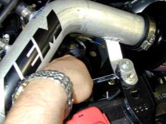 Install the included rubber grommet into the small hole on the intake pipe.