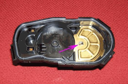 7 of 12 12/28/2015 8:40 PM 16. Place the TP sensor cover in the position as shown. Confirm the TP sensor drive slot orientation is aligned in the TP sensor cover as shown.