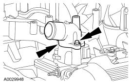 5. NOTE: The thermostat housing bolts are tightened in sequence with the intake manifold bolts.