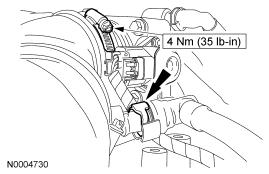 30. Connect the electronic TB electrical connector. Push back the red clip. 31. Install the air cleaner outlet pipe and tighten the clamp. Connect the engine vent tube. 32.