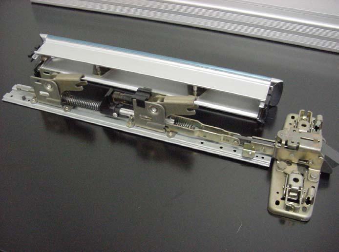 STEP 5: SEPARATE PUSH-PAD FROM ACTIVE MECHANISM. SLIDE PUSH-PAD TOWARDS DEVICE HEAD TO SEPARATE.