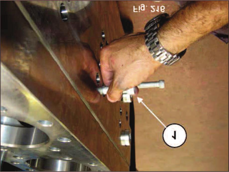 Back off the screw and then re-tighten it with a torque wrench as described in Section 3.