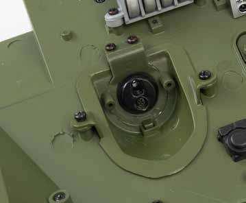 the outer machine-gun mounting plate (032B),