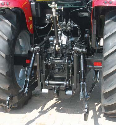 Fender-mounted switches provide convenient linkage height adjustment for fast, easy implement attachment.