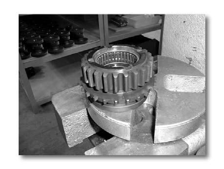 1A) (b) Press bearings into both sides of the drive sprocket so they seat just past the inside chamber. (Fig.