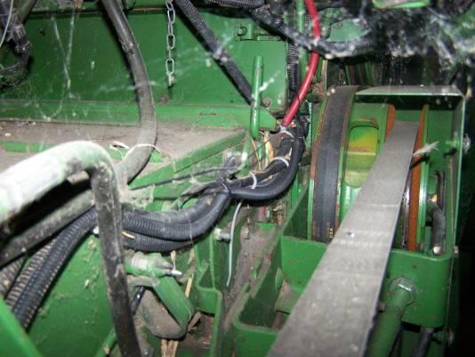 1. Remve the access plate in the right frnt crner f the cab flr and ntch it fr the cable t g thru. Rute the 16 pin plug end f the cable up t the cntrller.