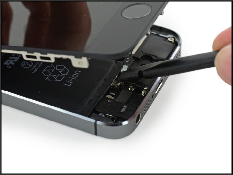 Step 11 Use the flat end of a spudger to snap the front portion of the Touch ID cable bracket down over the cable connector.