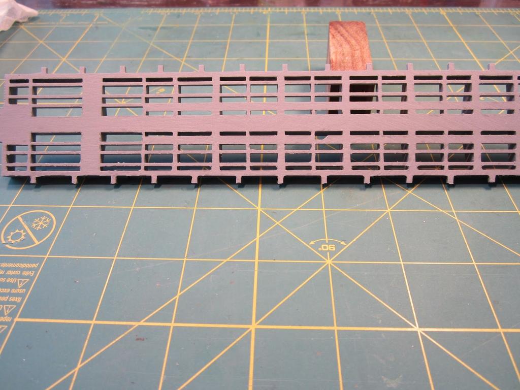 TTX FLATCAR INSTRUCTIONS PARTS LIST: 1- cast resin frame 3-laser-cut wood deck pieces, all different 4-styrene channels 1-decal envelope 1-AB brake set 1-detail bag containing: 1-brake wheel 1-brake