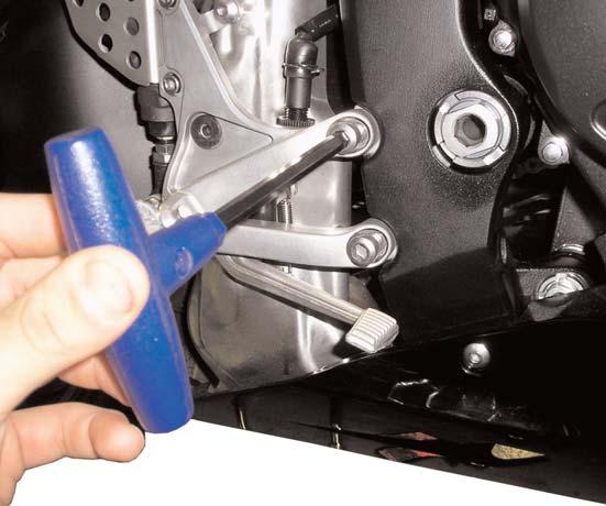 19)Carefully remove the complete muffler assembly from the motorcycle.