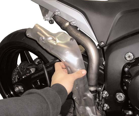 Do not tighten the clamp at this time. Make sure the t-bolt clamp does not hit the swingarm when mounted.