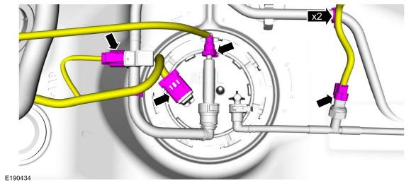 5.Disconnect the fuel tank filler pipe vent tube quick release coupling. 6.