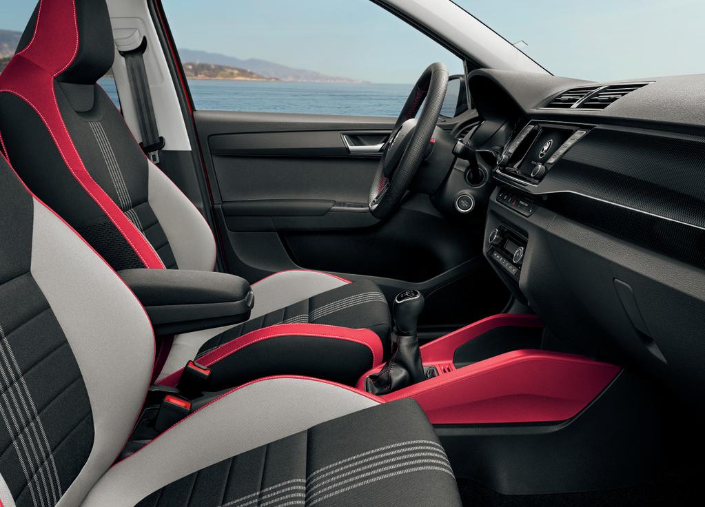 INSIDE, IT S ALL-IN SPORTS SEATS The interior features sports front seats and upholstery in a combination of red, black and grey.