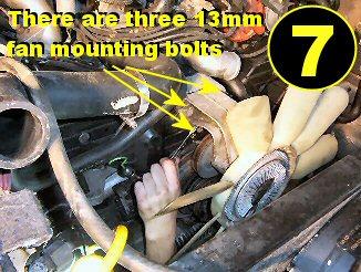 Next, we want to remove all the belts from the motor.