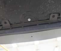 (10) screws from the underside of the fascia.