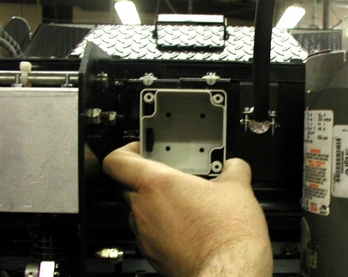 2. Locate the base of the E-Stop enclosure on the pinspotter s box beam where shown in Figure 13 (between Sweep Motor and Table Solenoid). Figure 13 3.