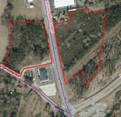 Burton Industrial Park $1,300,000 This sale offering includes +/- 13 acres of vacant land. Property has endless potential for development.