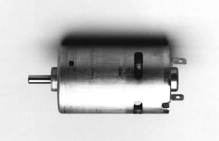 DC Motor and Generator Theory 9 FIGURE 9 This permanent magnet DC motor contains four permanent magnets bonded to the motor s case instead of field windings.