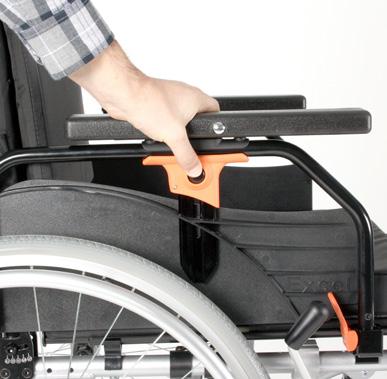 wheelchair; To fold down the armrest, engage the orange lever as