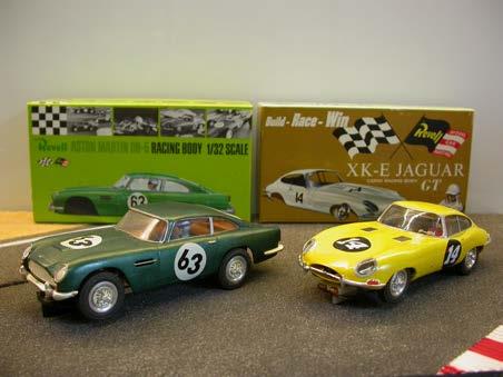 2. Aston Martin DB5 No. 63 As new. Complete. Metallic green. With working lights in the front.