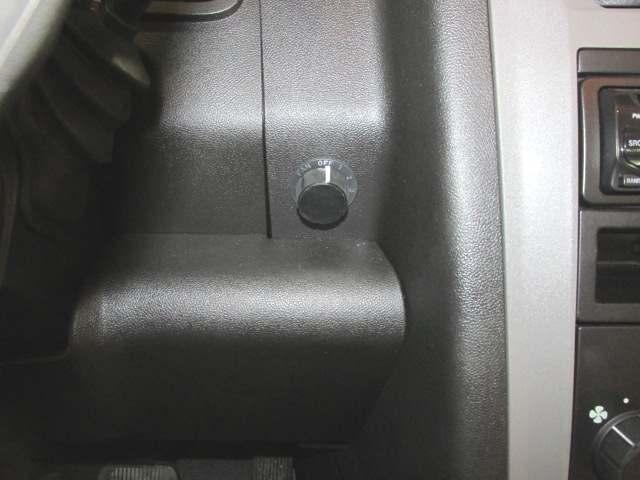 Insert switch into mounting hole, secure in place with