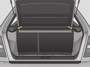 Luggage compartment cover Folding rear seat back n First of all, insert head restraints into the backrest. n Then, fold back rear seat backrest until it locks in position - pull as a check.