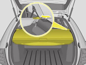 Luggage compartment cover (Estate) Raised luggage area* (Estate) CONTROLS AND EQUIPMENT n Pull the luggage compartment cover in the direction of the arrow into the recesses on the sides of the