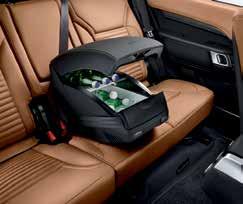 With a leather covered top, it is held in place by the centre seat belt and powered from the rear auxiliary socket.