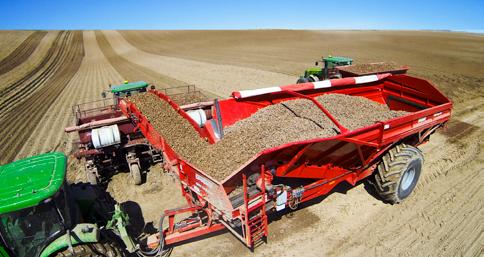 Planting efficiency is increased by bringing the seed to the planter, with the ability to fill up to four, The position of the boom allows Use it year round 6-row