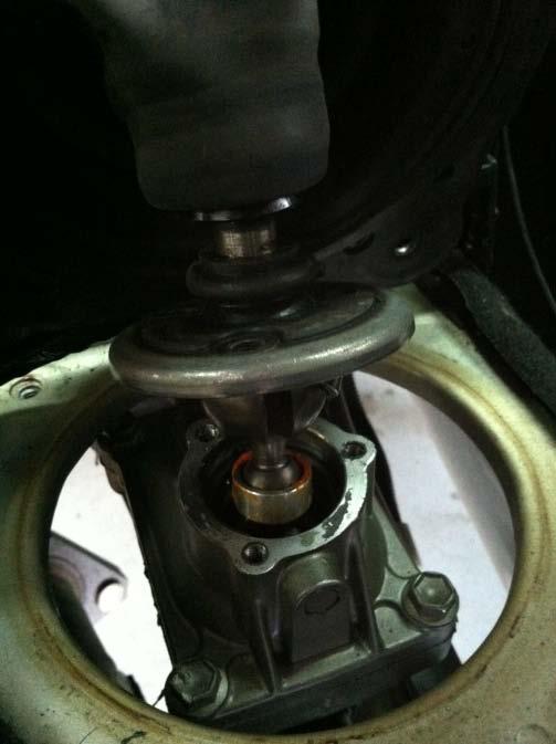 Once your shifter and bushing is fully seated into the bushing cradle in the turret, move the shifter around to ensure it rotates and you can select gears, then reinstall and tighten the three 10mm