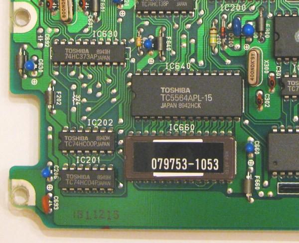 We need to remove IC660 (the chip with the stick on label at the bottom left of the above picture, closeup pic below). The board will also be silk screened with IC660.