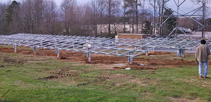 Rack Construction LOCAL CONSTRUCTION INCLUDES SITE PREPARATION, RACK CONSTRUCTION, SECURITY FENCE CONSTRUCTION, AND SOLAR PANEL INSTALLATION.