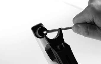 2) Unscrew the size 4 Allen head screw at the centre of