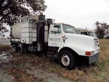 equipped with Guzzler ACE (AXXCF4116TC), 2,300 gallon wet/dry vactor body, PTO driven vacuum pump, hydraulic dump, tailgate and locks, vibrator, spring/beam suspension, and 11R22.5 tires.