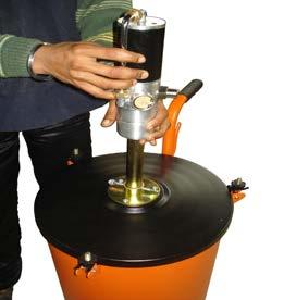 Place the follower plate in the grease drum with the lift handle facing upwards.
