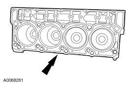 30. Check for cylinder head distortion. For additional information, refer to Cylinder Head Distortion in this section. 31. Remove and discard the cylinder head gasket and dowels.