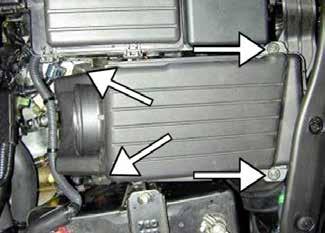 Remove the upper air box and air filter from the
