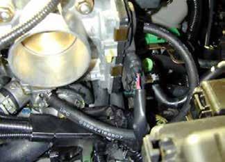 CAUTION: Ensure the engine is completely cool before removing the coolant hose, or hot coolant will escape