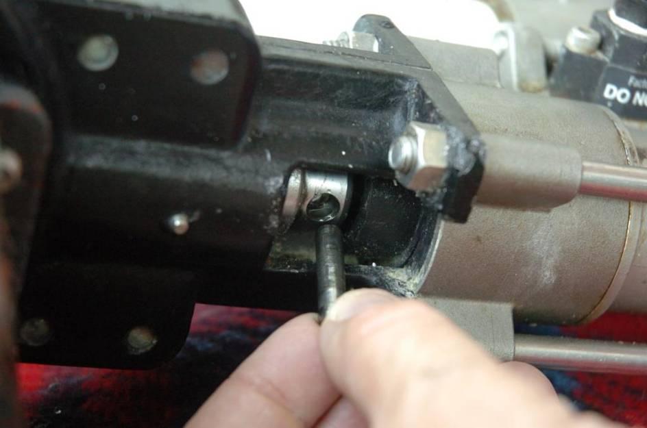 Then push the pin out from one side using your screwdriver and