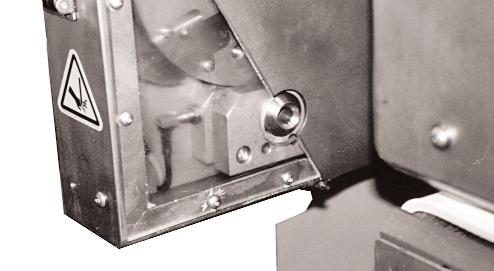 Three safety switches are included on cutter: a keyed safety switch on the knife guard, and a proximity switch on each cutter bushing.