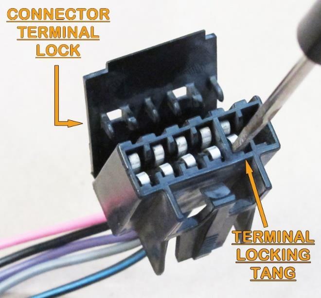 To remove the terminals from the factory connector the connector s terminal lock will need to be pried up. The locking tang of the factory terminals will need to be depressed to remove the terminal.