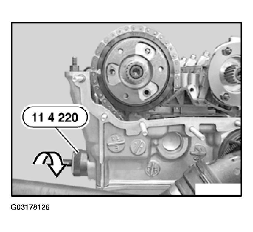 Fig. 209: Inserting Special Tool 11 4 220 In Cylinder Head Insert and