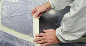 Apply the appropriate 3M masking products to suit the repair area and move vehicle into the booth.