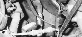Fasten the extension with a 3/8 x 1-1/2 bolt, two 3/8 SAE washers, and a nut. 34. Install the lower steering shaft on the extension by aligning the marks on the shafts (Fig. 11).