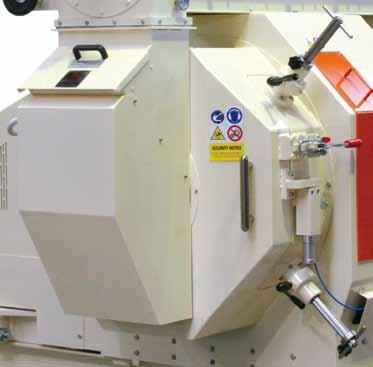 A permanent magnet is fitted in the chute to avoid ferrous metal entering the die.