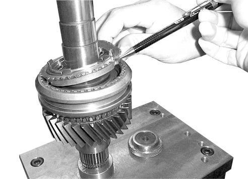 the output shaft by using a press.
