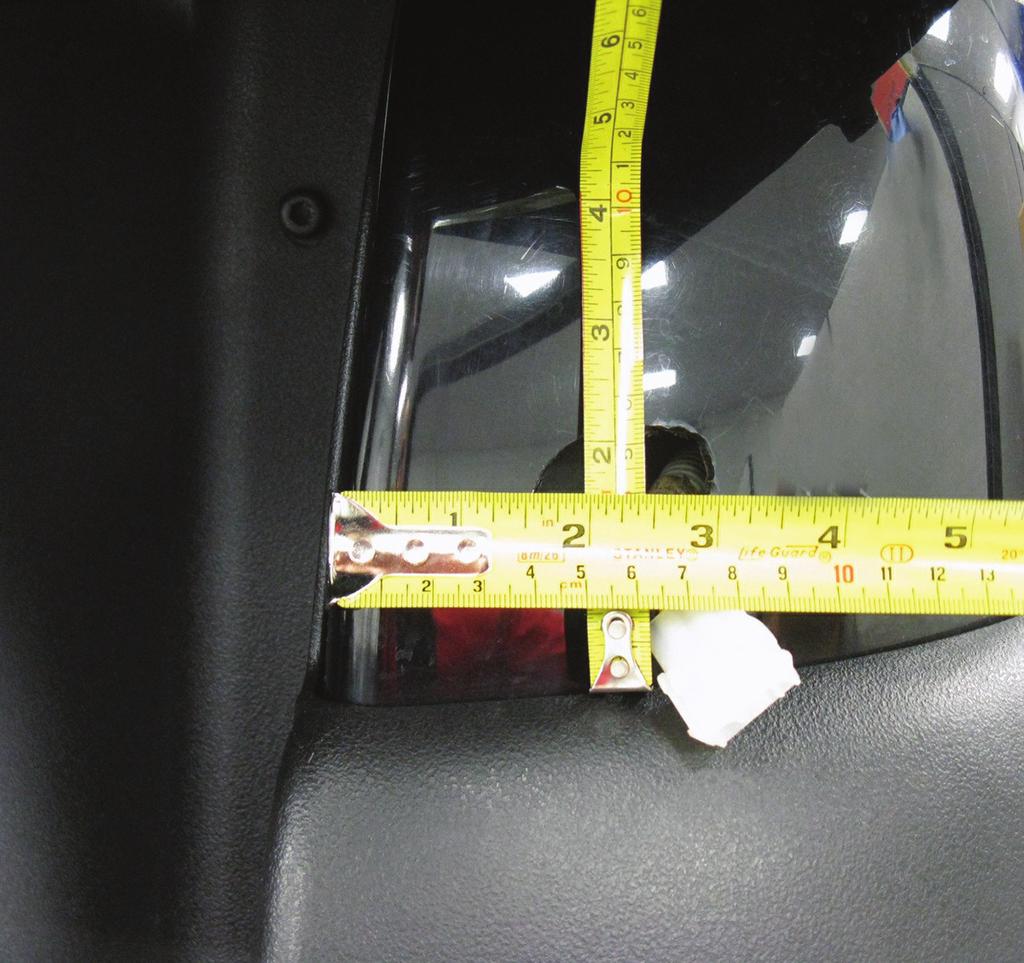 Cut the taillight holes by measuring from the top edge of the bumper. Measure up 1-1/2 and draw a horizontal line.