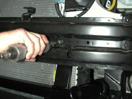 receiver brace. Place a 1¼" x 1-5/8" spacer on the top side of the bolt. 14.