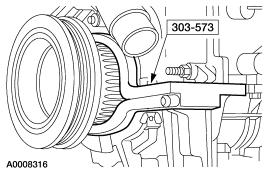 Remove the accessory drive belt. For additional information, refer tosection 303-05. 5. Remove the thermostat housing. For additional information, refer tosection 303-03. 6.