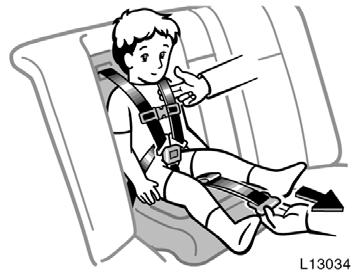 9. Pull the seat belt adjustment strap (gray tab) firmly until the shoulder belts are snugly adjusted around the child s shoulders.